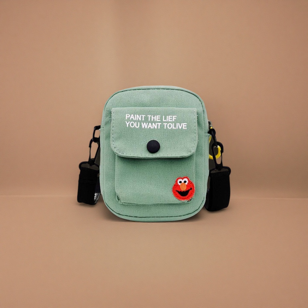 浅绿色帆布斜挎包正面白色字母PAINT THE LIFE YOU WANT TO LIVE黑色按扣红色艾摩刺绣 Specification image