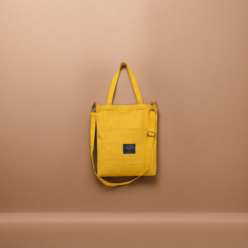 The yellow canvas bag is simple and versatile for commuting, with a shoulder and a large-capacity tote bag