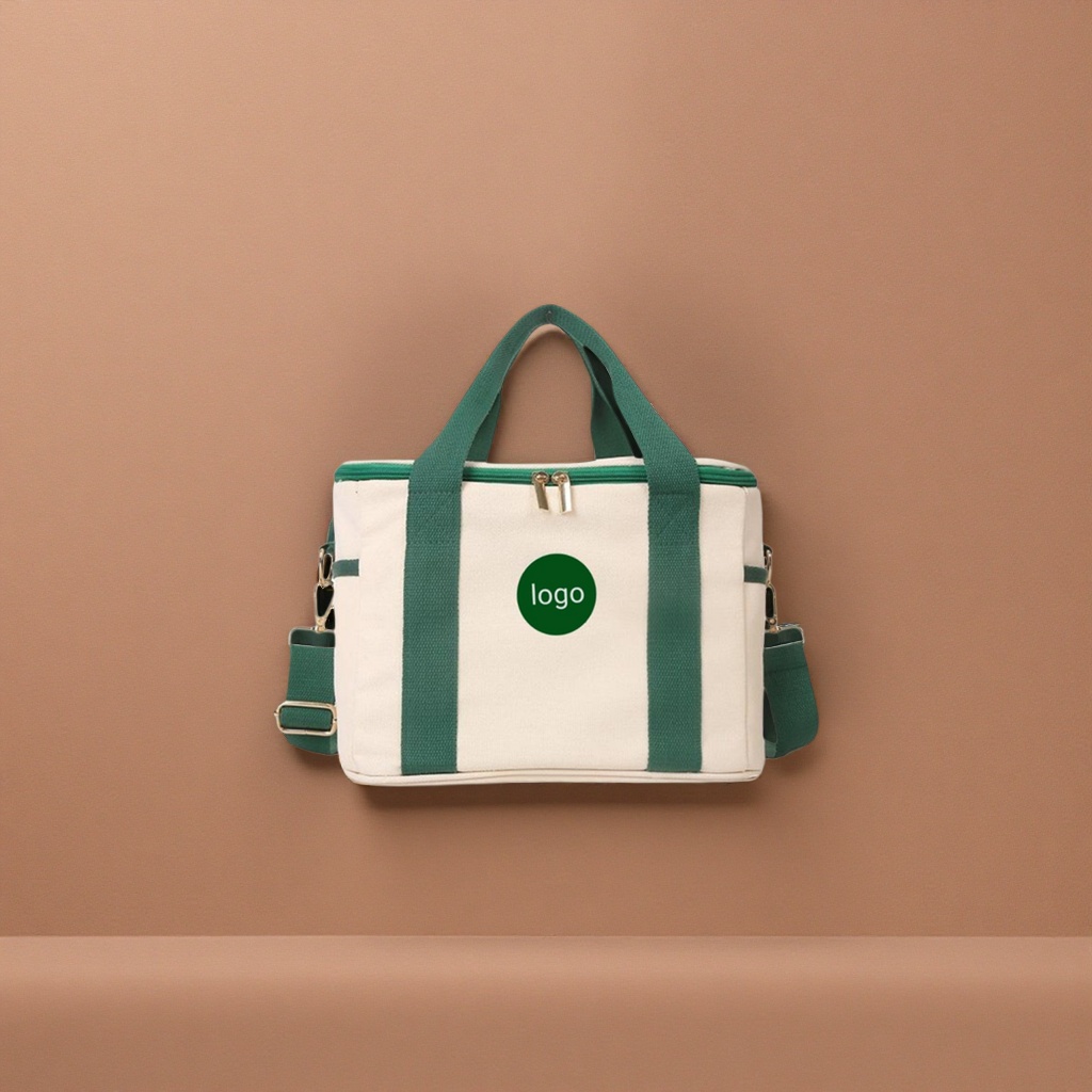 A simple and versatile hand-held shopping bag with a green handle and off-white canvas