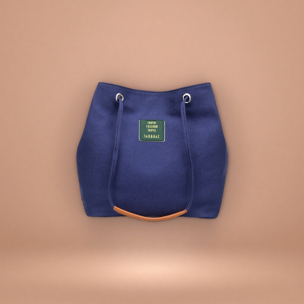 A simple and versatile single-shoulder tote bag with a deep blue canvas details Picture