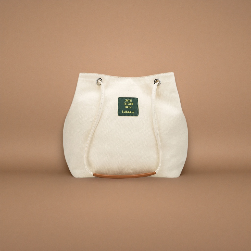 The off-white canvas bag is a simple, versatile, hand-held and shoulder-carrying commuter casual lady's bag Specification image