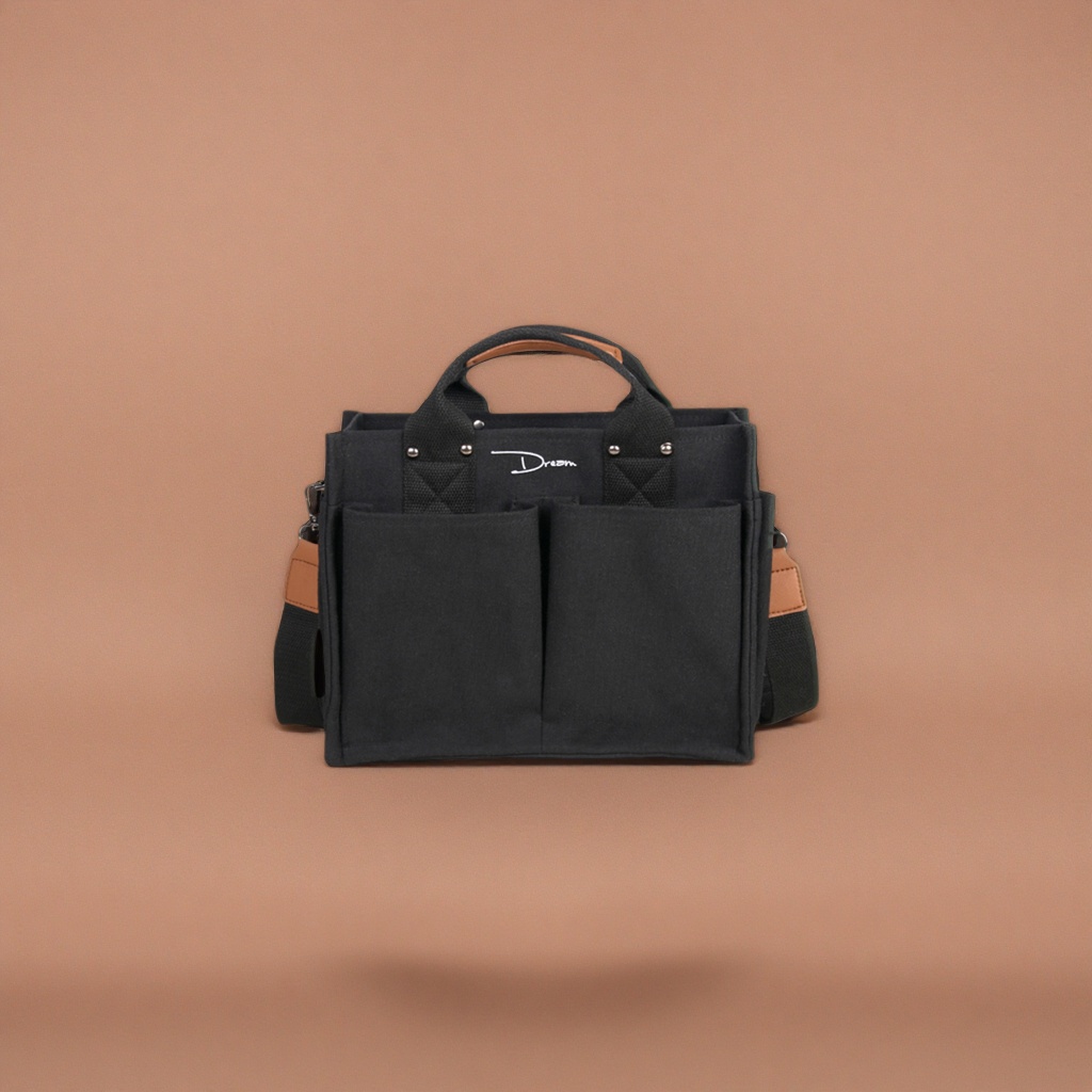This black canvas bag is simple and versatile, with a large capacity for commuting and casual use. It is a single-shoulder crossbody bag Application Scenario