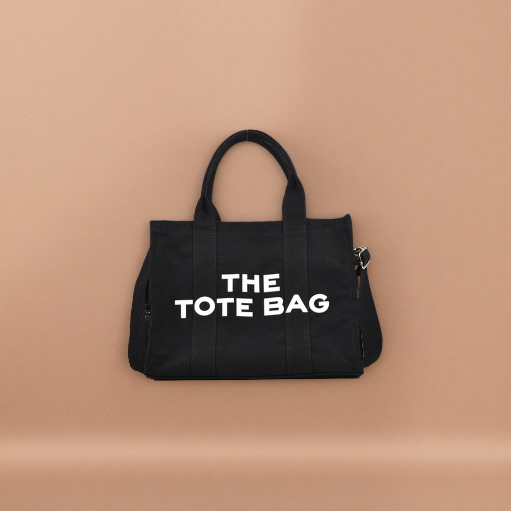 This black tote bag features a large capacity for commuting, a shoulder bag, and is fashionable, simple and versatile for women