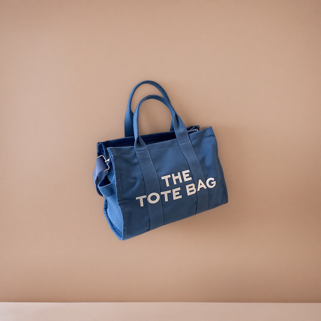 The blue canvas tote bag is a large-capacity commuting shopping handbag that is simple and versatile Application Scenario