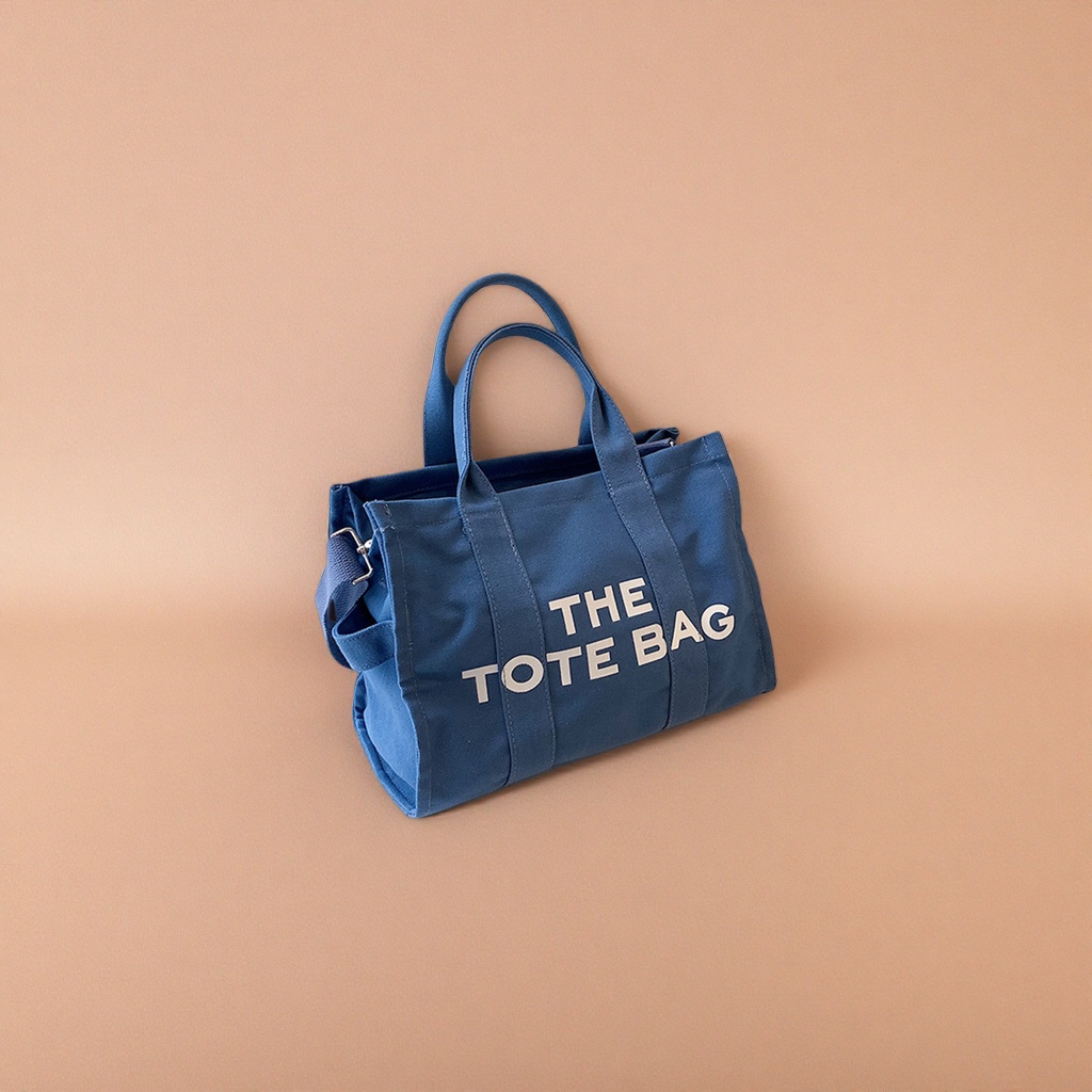 The blue canvas tote bag is a large-capacity commuting shopping handbag that is simple and versatile Specification image