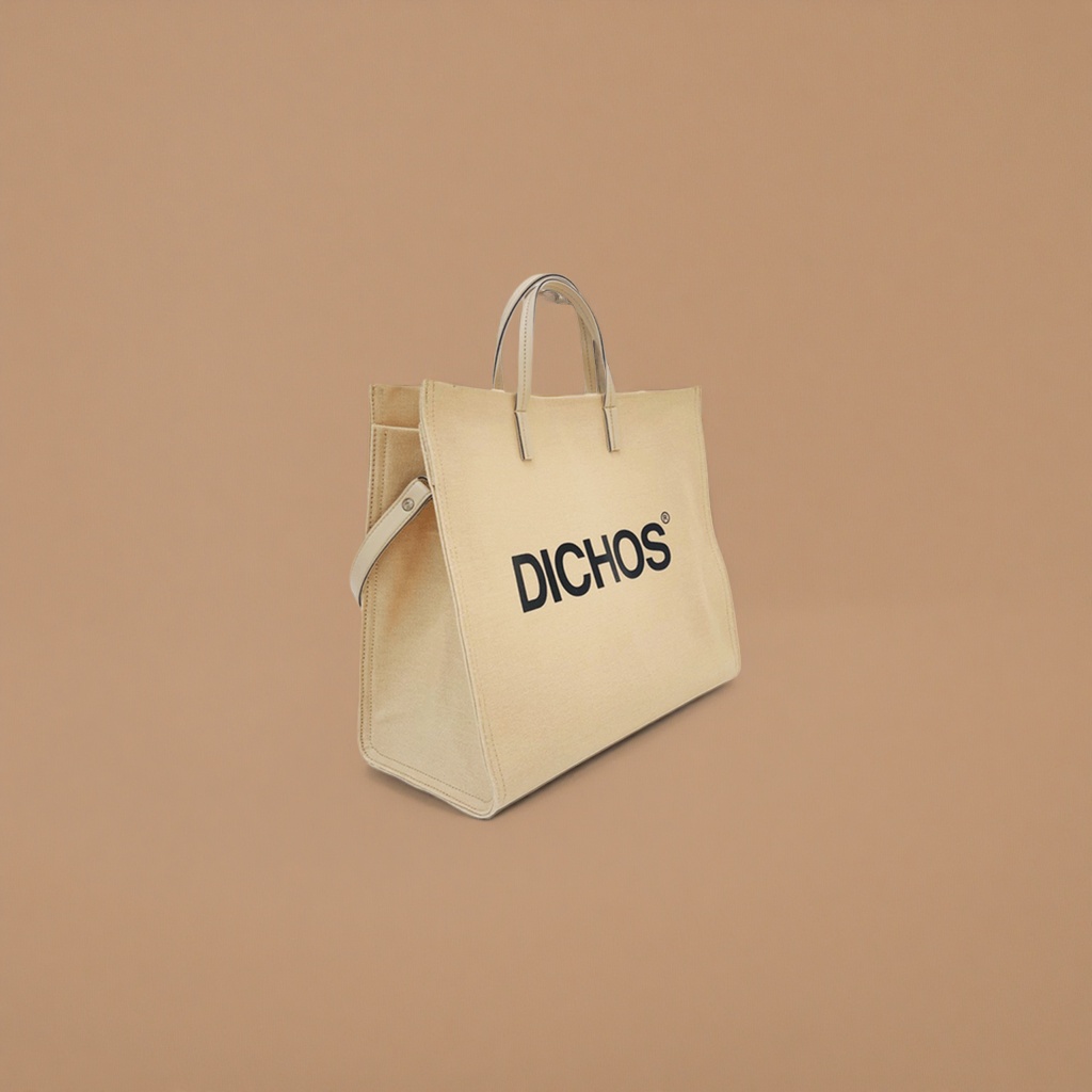 The front of the beige canvas tote bag is printed with the black word "DICHOS" Specification image