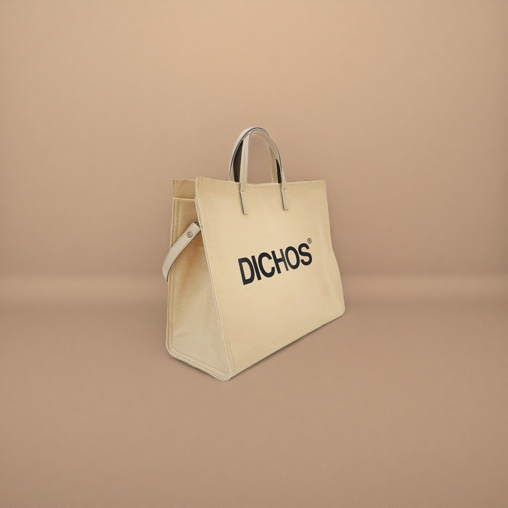 The front of the beige canvas tote bag is printed with the black word "DICHOS" details Picture