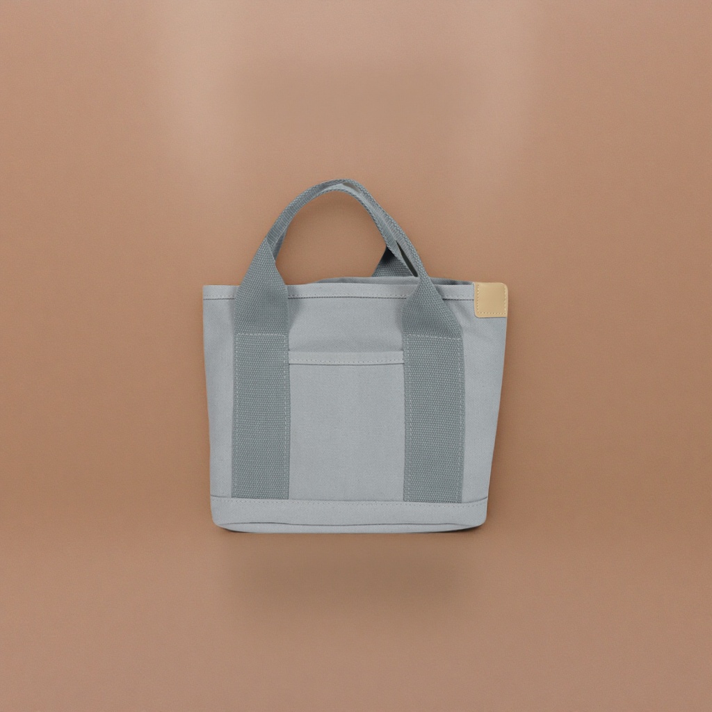 The thickened grey canvas handbag is wear-resistant and practical for daily commuting and business trips for storage details Picture