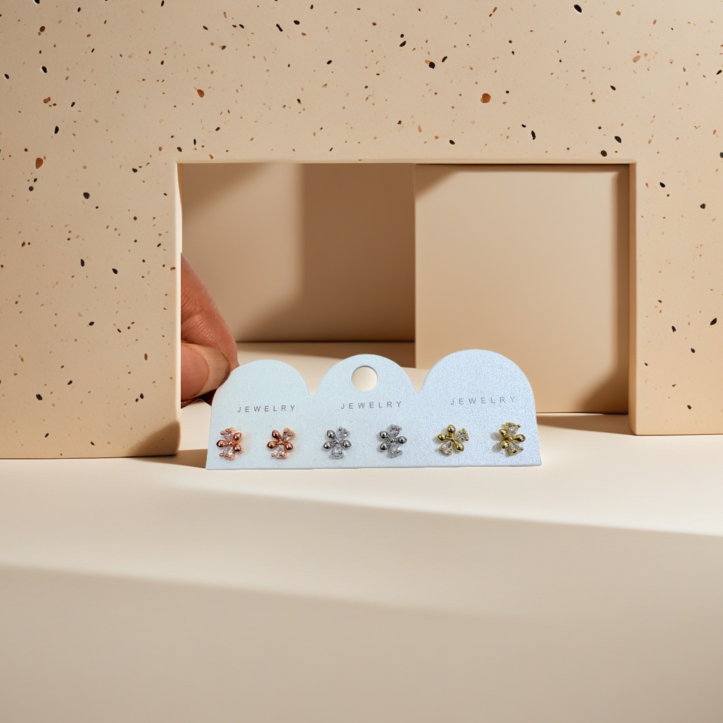 White stud display card with five pairs of flower-shaped stud sets Specification image