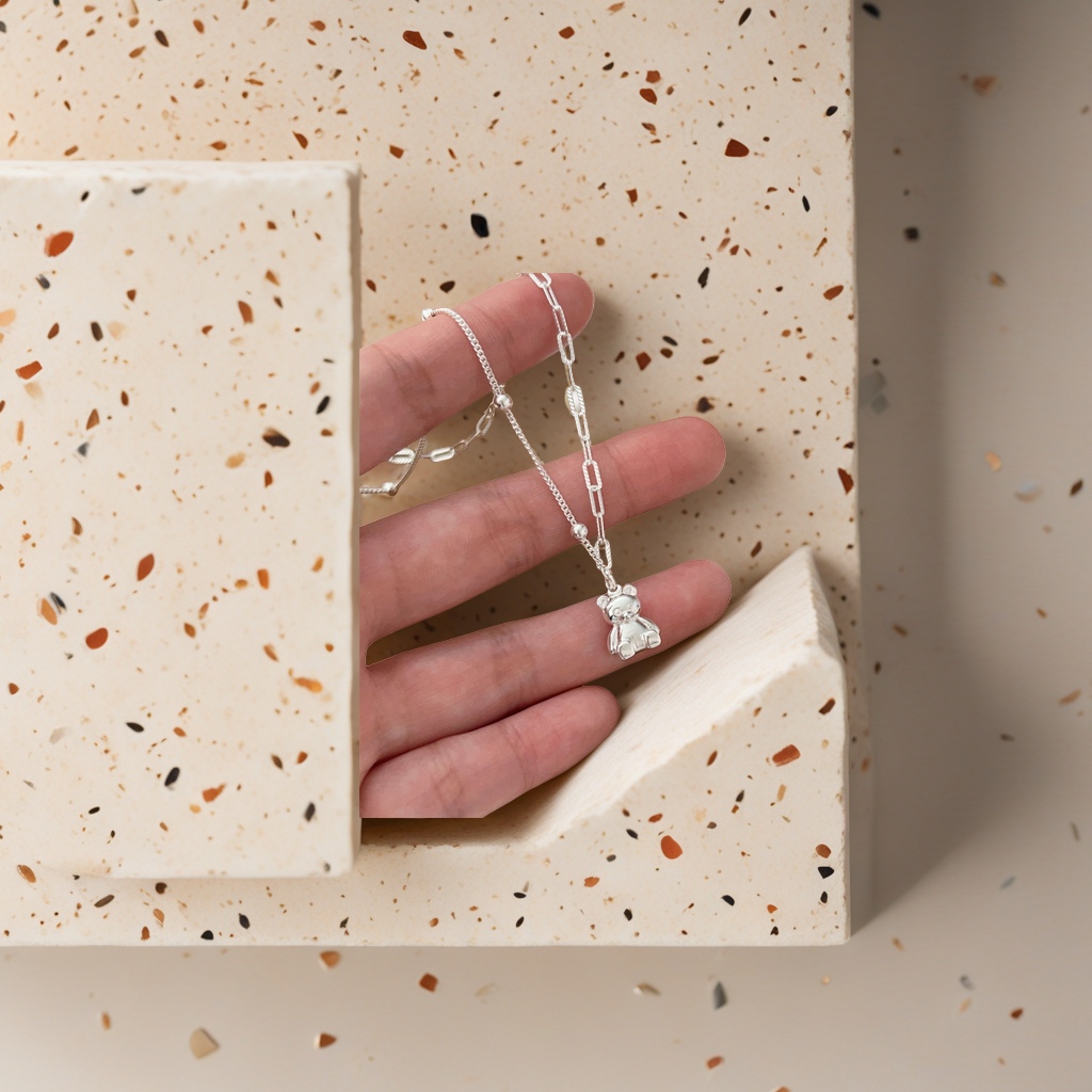 The silver bear pendant necklace is a simple, versatile and fashionable accessory details Picture