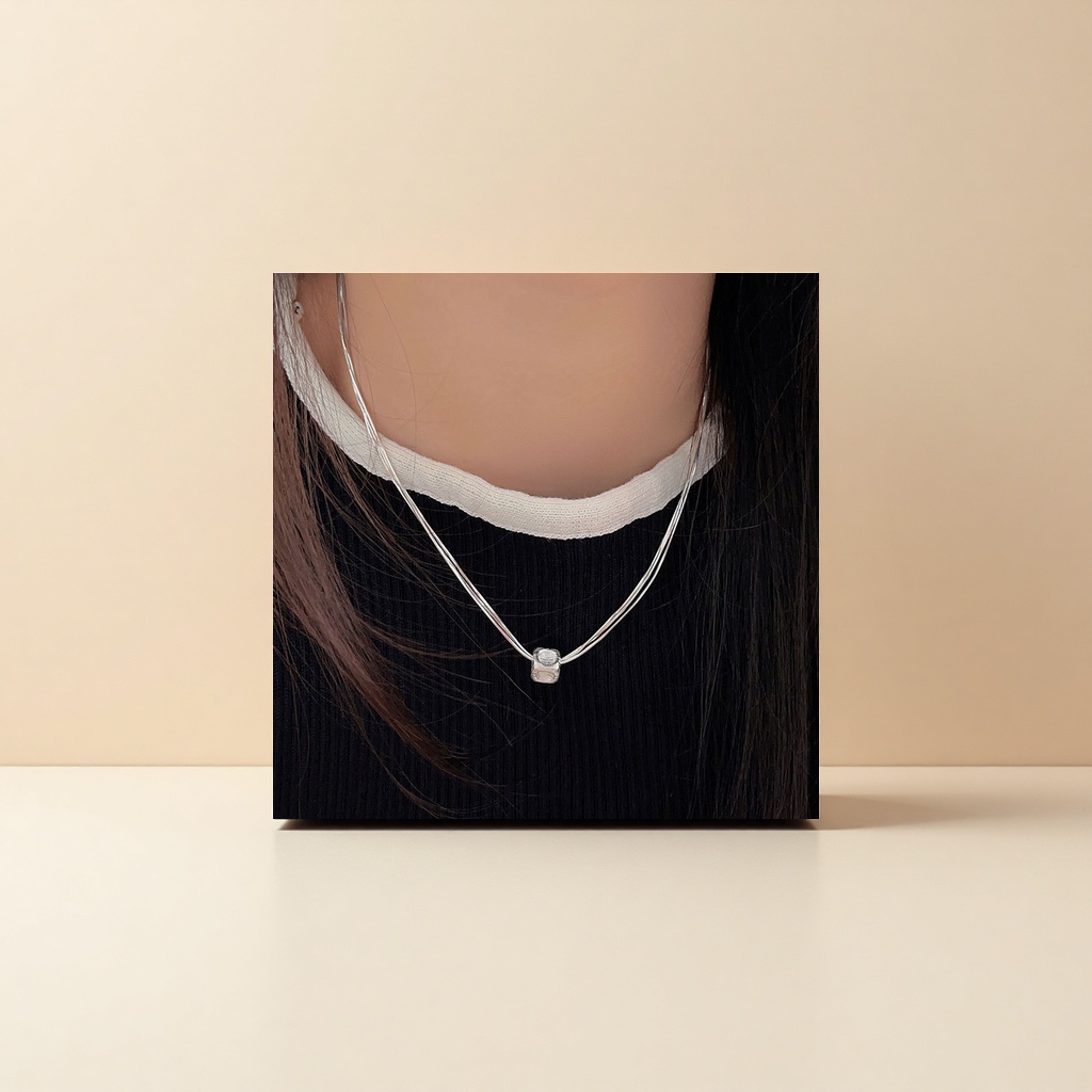 A silver multi-strand chain necklace with a square pendant Specification image