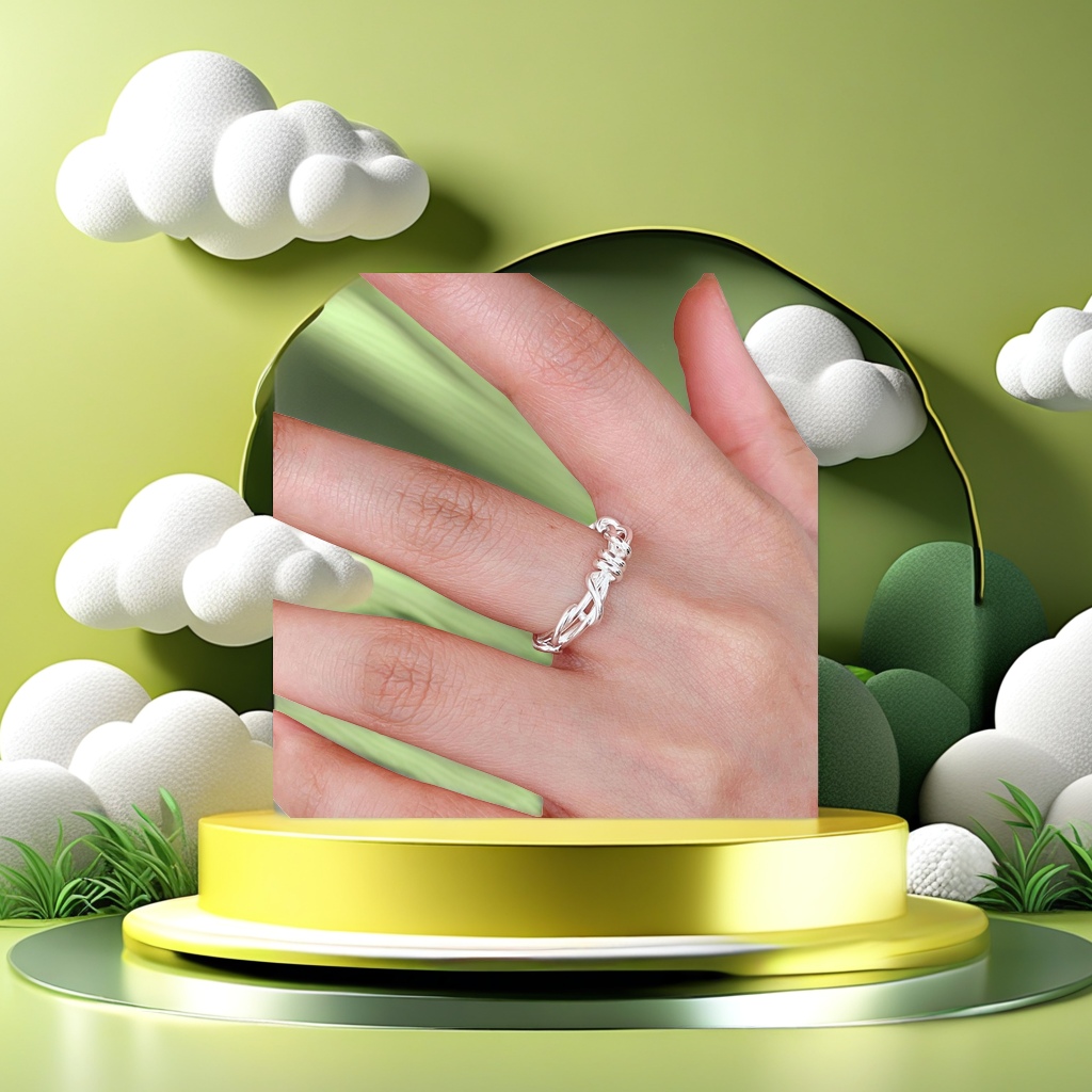The silver twisted rope design ring is simple and fashionable to wear on the finger