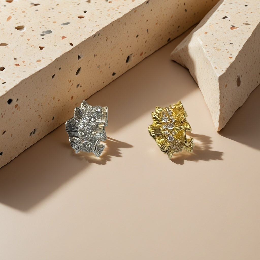 Gold and silver leaf-shaped diamond-encrusted stud earrings Specification image