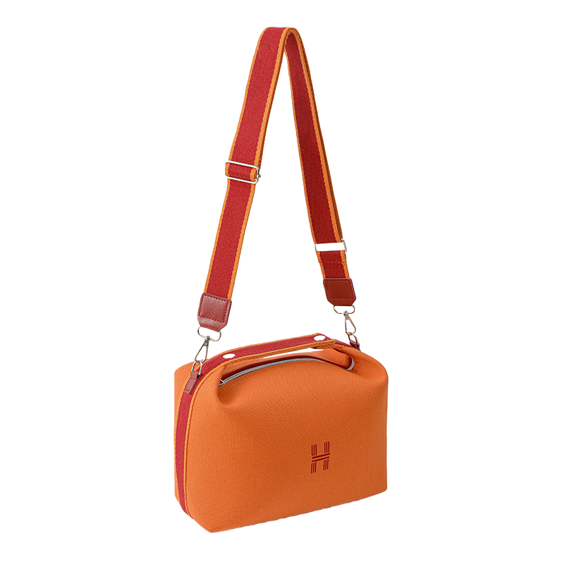 A fashionable women's single-shoulder bag with an orange handbag and a red striped shoulder strap Item Picture