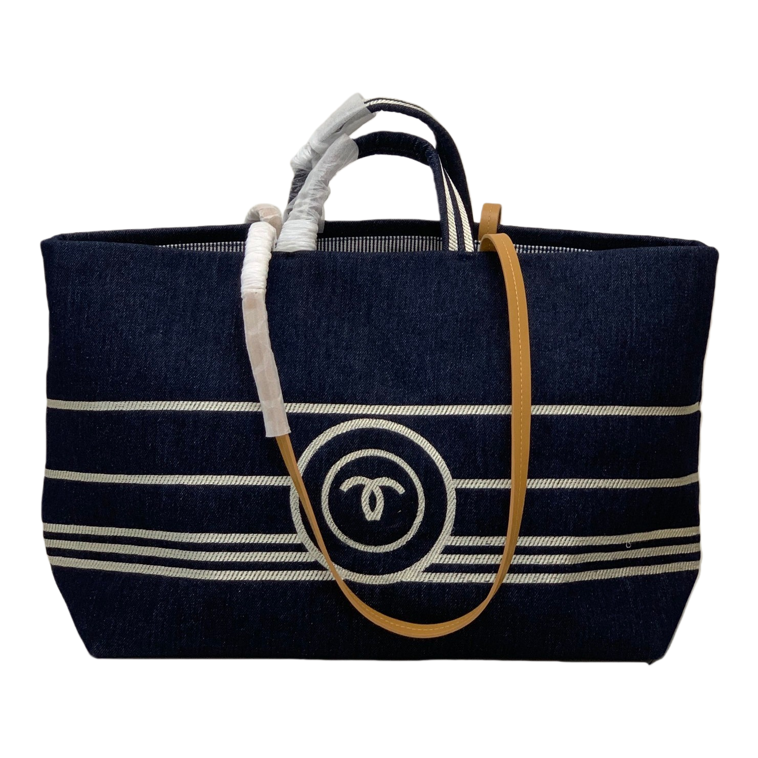 A dark blue striped canvas handbag with a beige shoulder strap and a white double C logo Item Picture