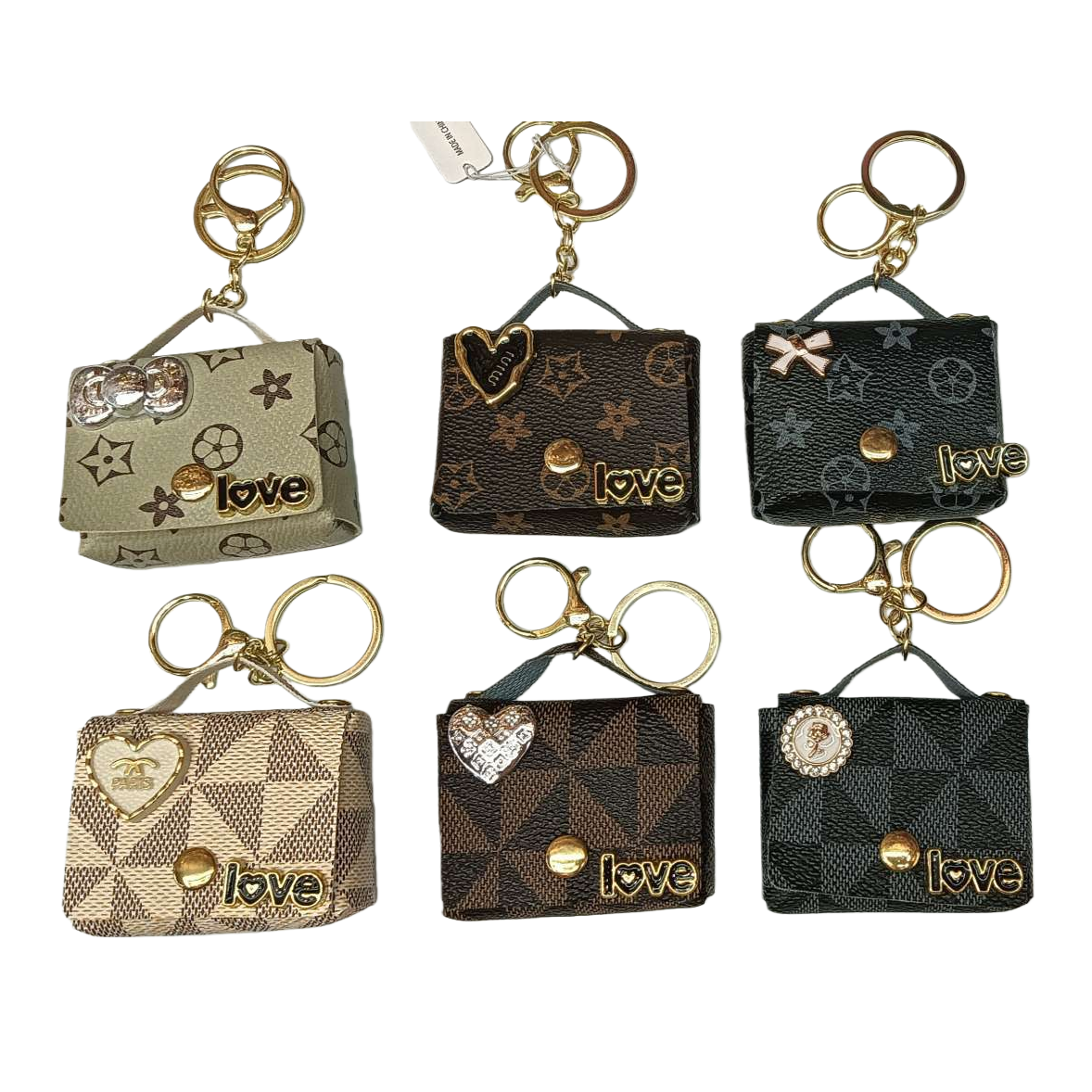 Six mini handbag keychains feature different patterns and decorative details Item Picture