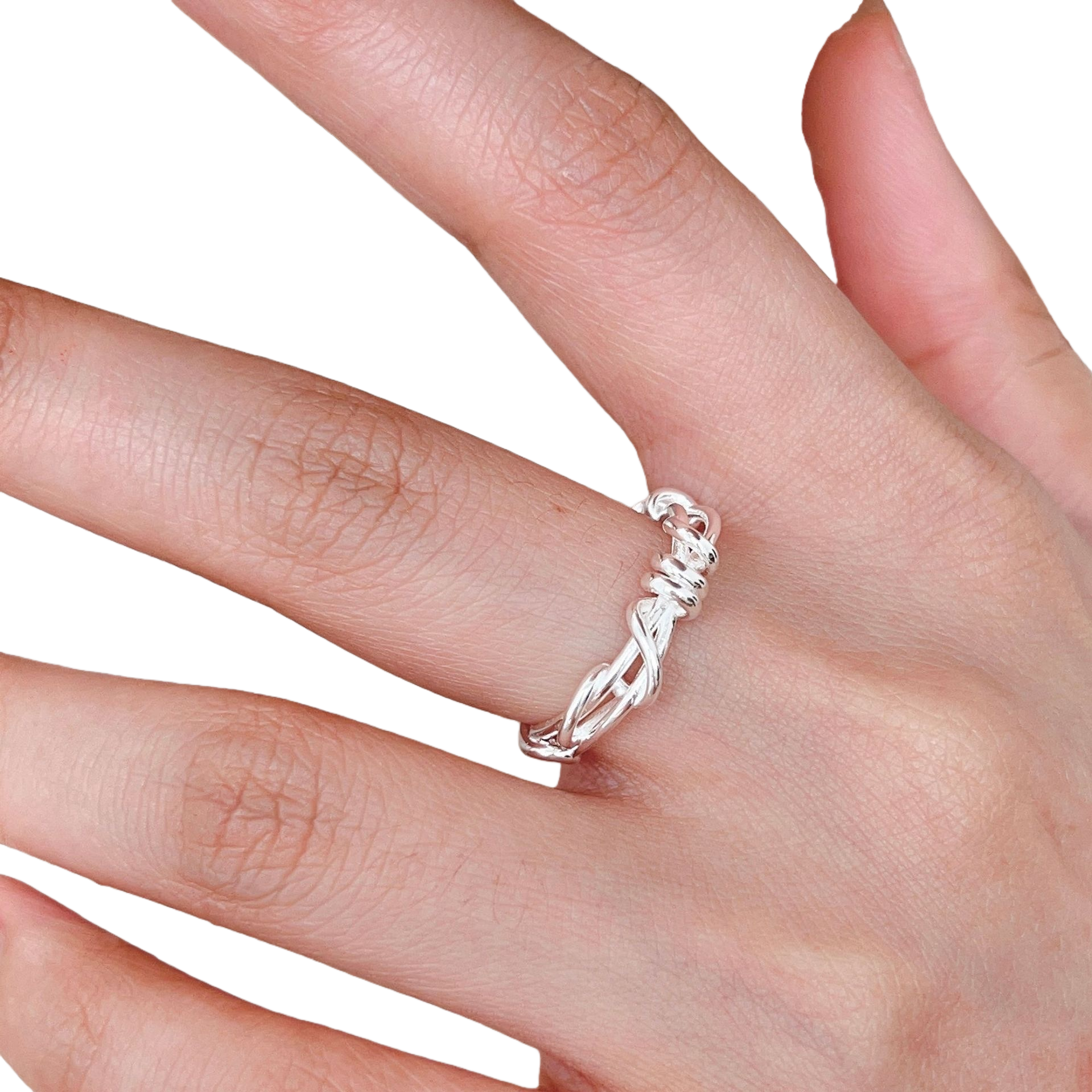The silver twisted rope design ring is simple and fashionable to wear on the finger Item Picture