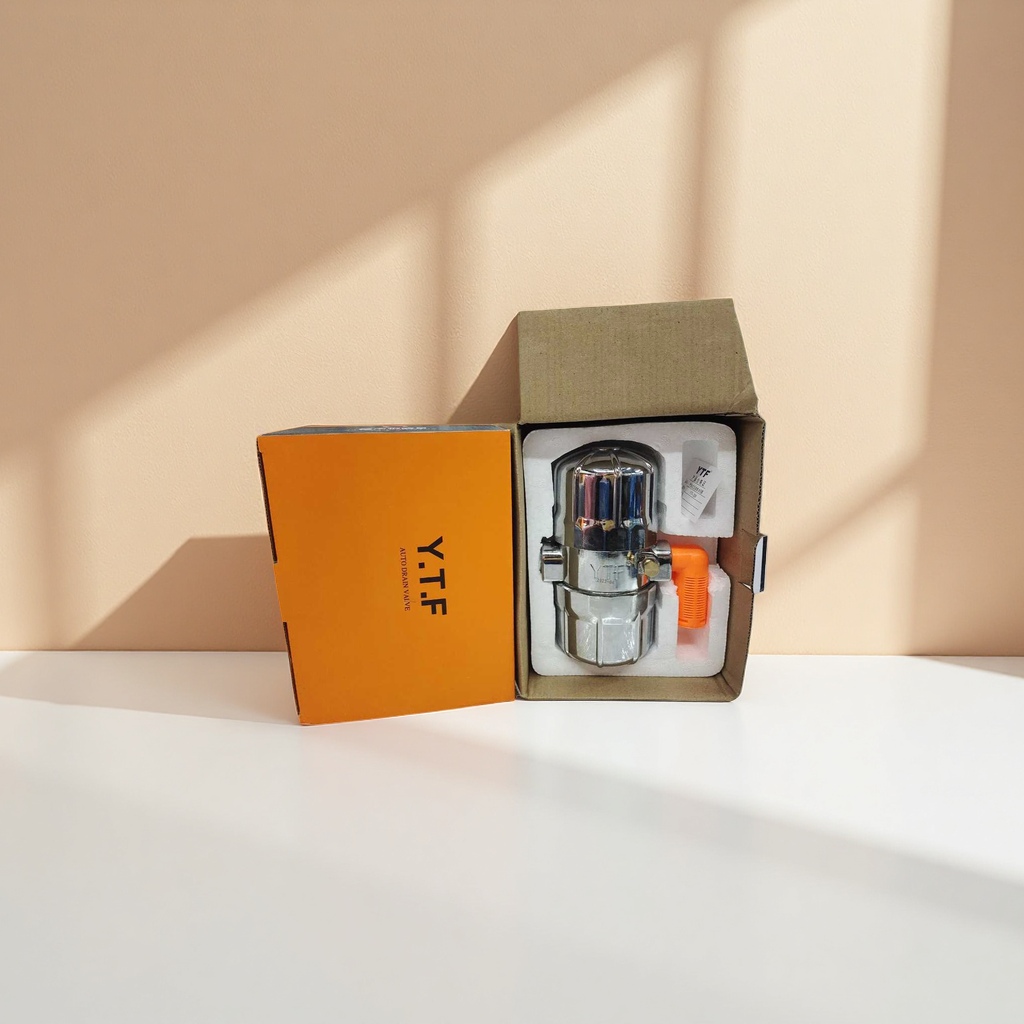 Silver metal automatic drain valve in orange packaging box details Picture