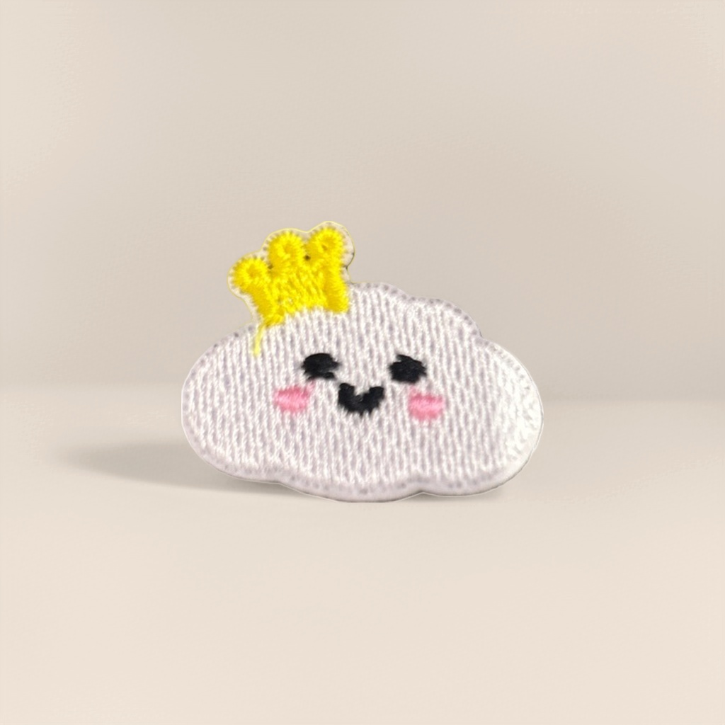 Grey striped background, pink cloud embroidered patches, wearing a small yellow crown, with black eyes and a smiling mouth Application Scenario