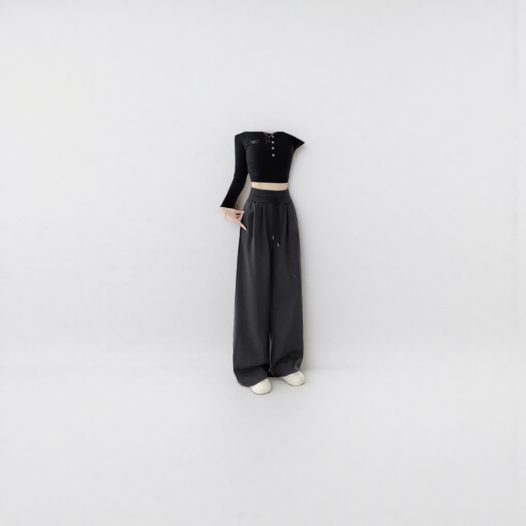 Dark grey long wide-leg pants paired with a black short top and white sports shoes Specification image