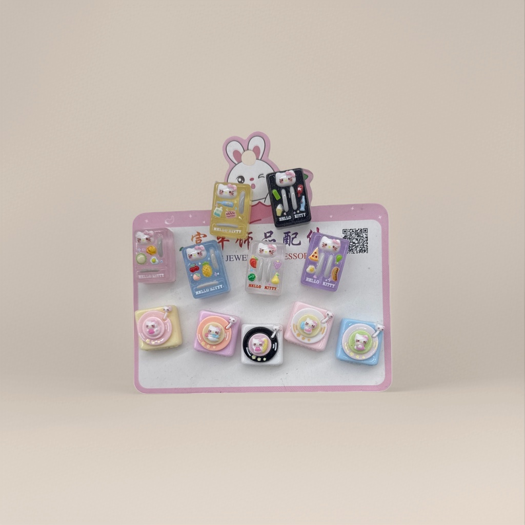 A cute and girlish accessory set of colorful Hello Kitty-themed trinkets details Picture