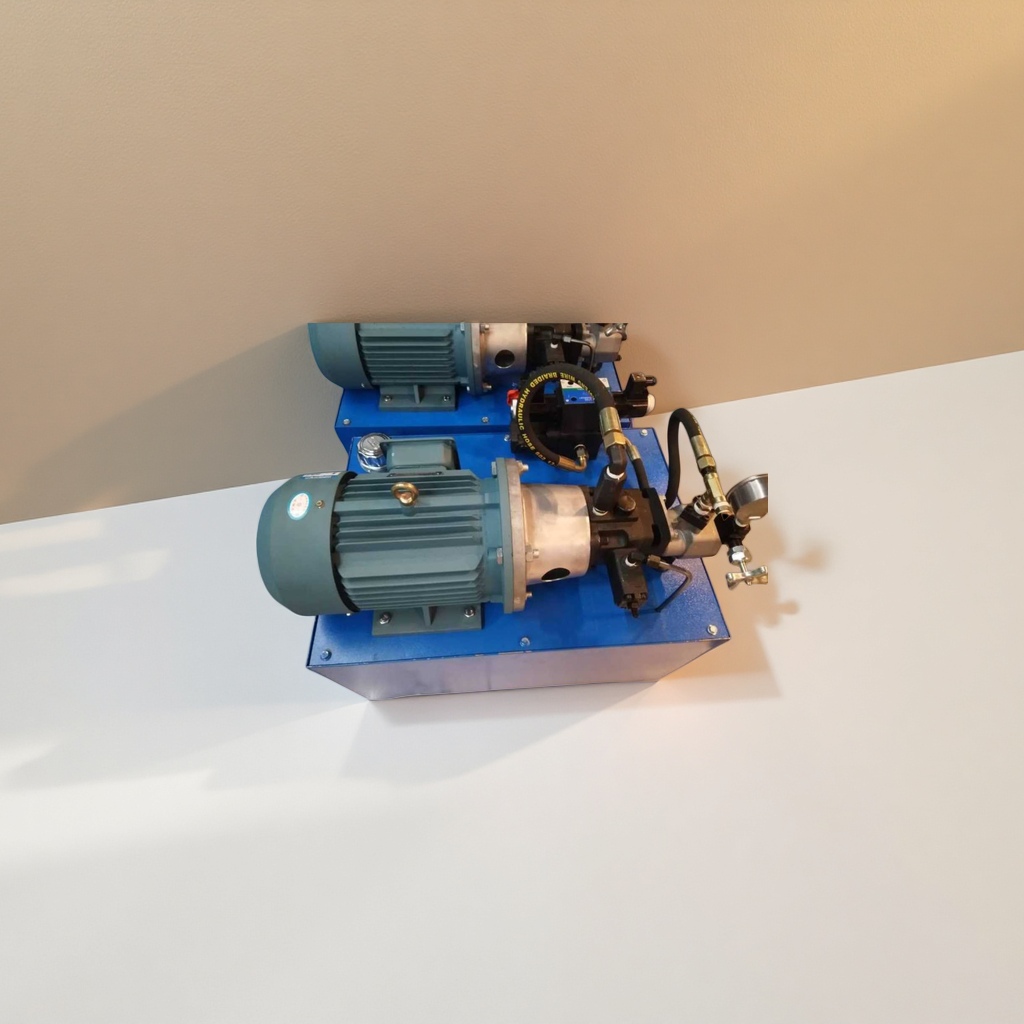 The blue base hydraulic pump unit is equipped with a green motor, a metal pump body and black hydraulic pipelines Application Scenario