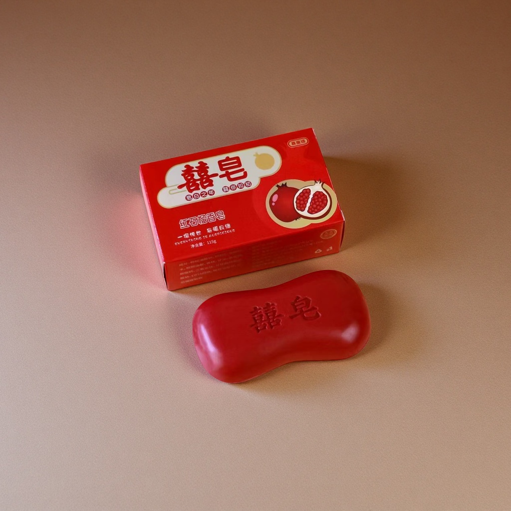 Red soap with packaging box, a household bath product for cleaning, moisturizing and gentle skin care