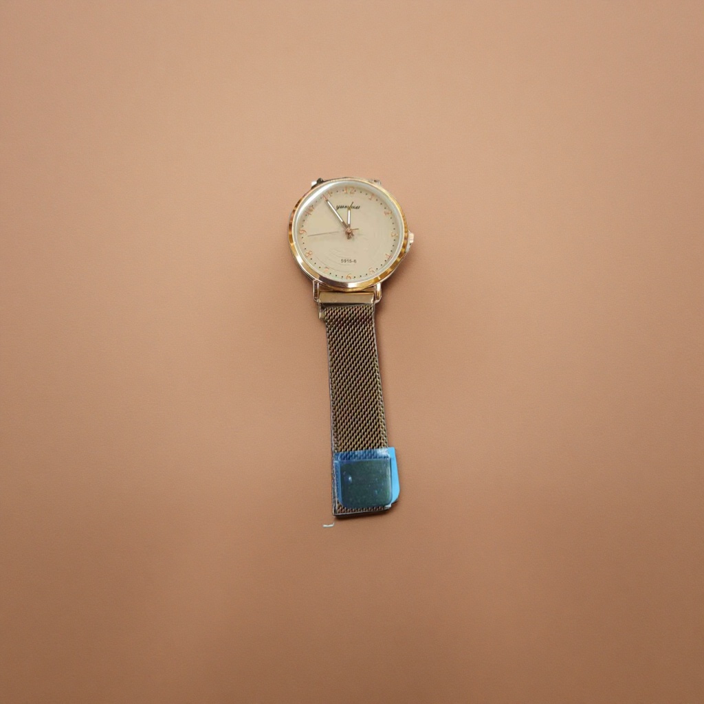 A simple and fashionable quartz watch for ladies with a golden case, beige dial and metal mesh strap Application Scenario