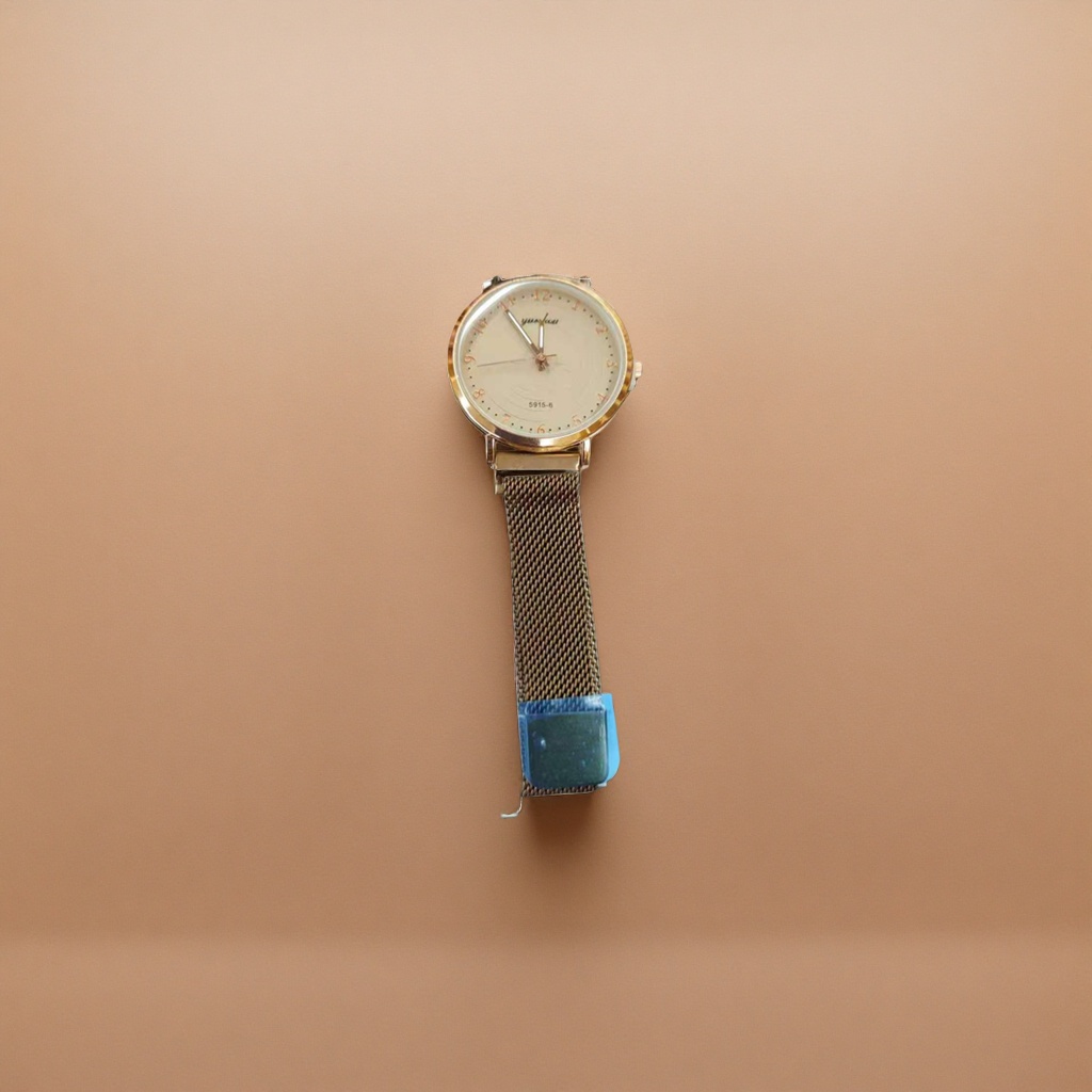 A simple and fashionable quartz watch for ladies with a golden case, beige dial and metal mesh strap Specification image