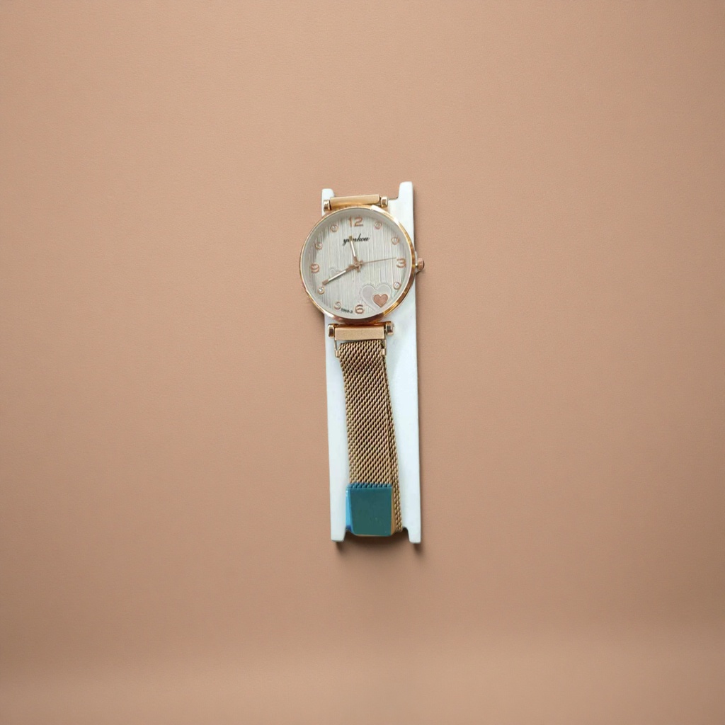 The watch features a golden case with white striped heart-shaped decoration and a metal mesh strap with a white stand Application Scenario