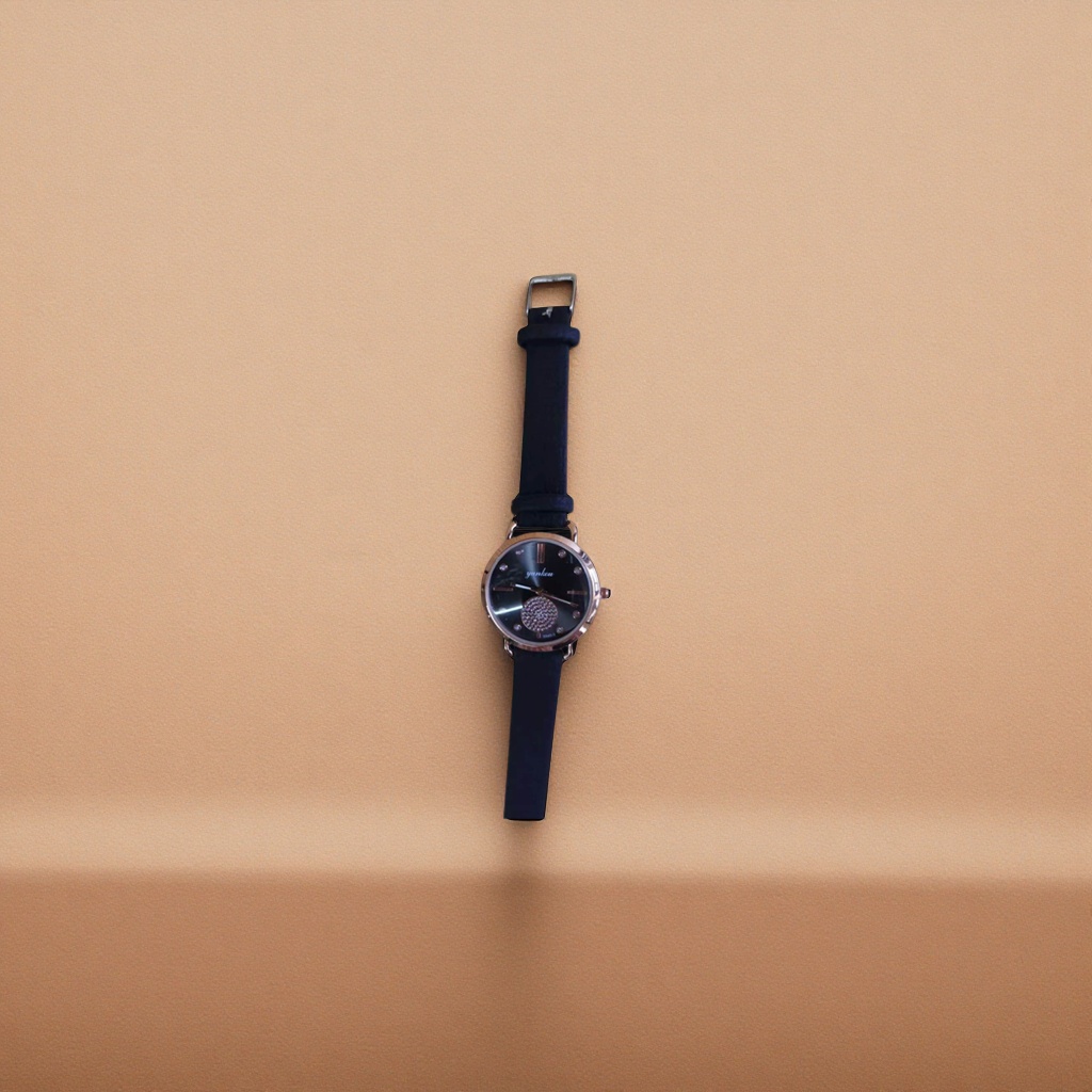 Ladies' quartz watch with black strap and rose gold frame details Picture