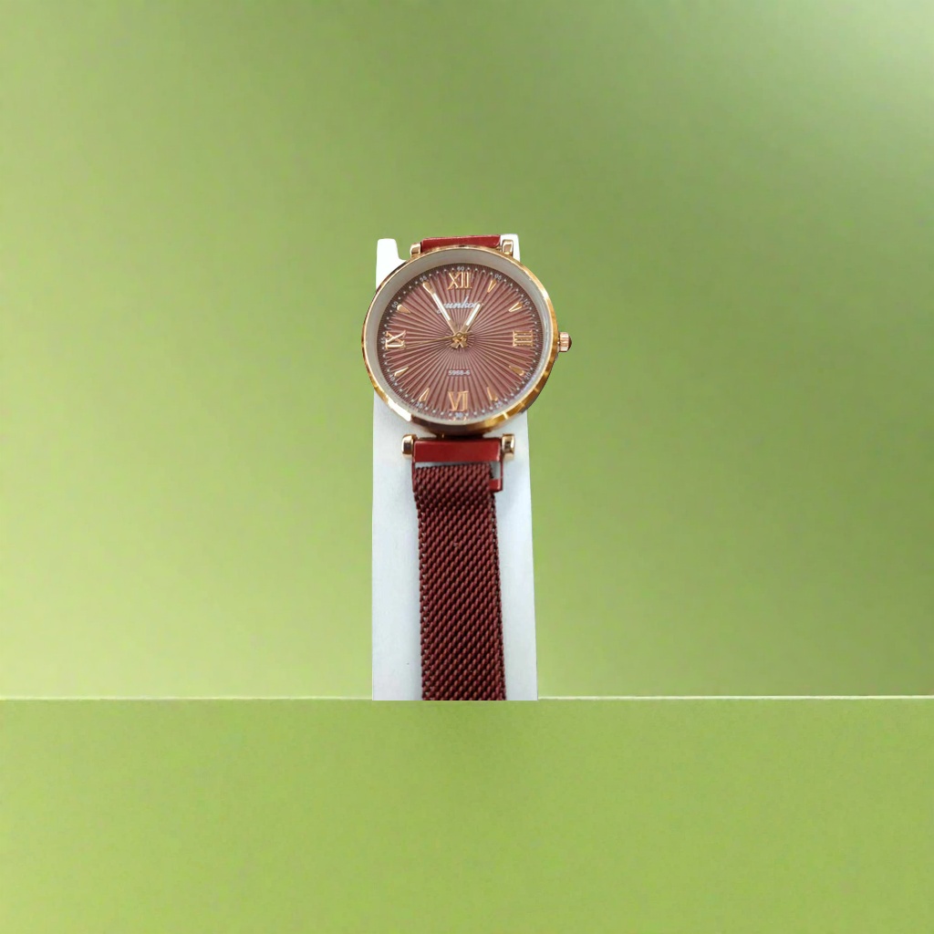 A ladies' quartz watch with a red strap and a golden case features a simple, fashionable and light luxury style