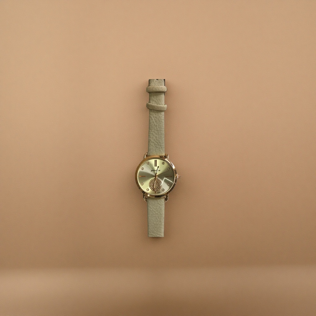 A simple and fashionable quartz watch for ladies with a beige leather strap and gold color details Picture
