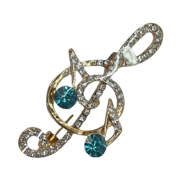 A golden note-shaped brooch set with blue and green transparent rhinestones and fashionable jewelry, wrapped in a white card Item Picture