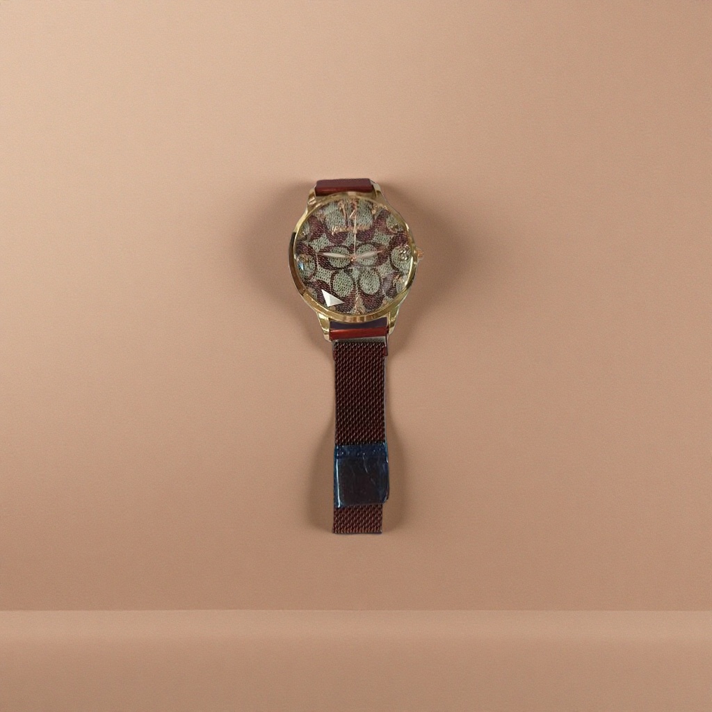 A fashionable and simple quartz watch with a golden case and a red strap