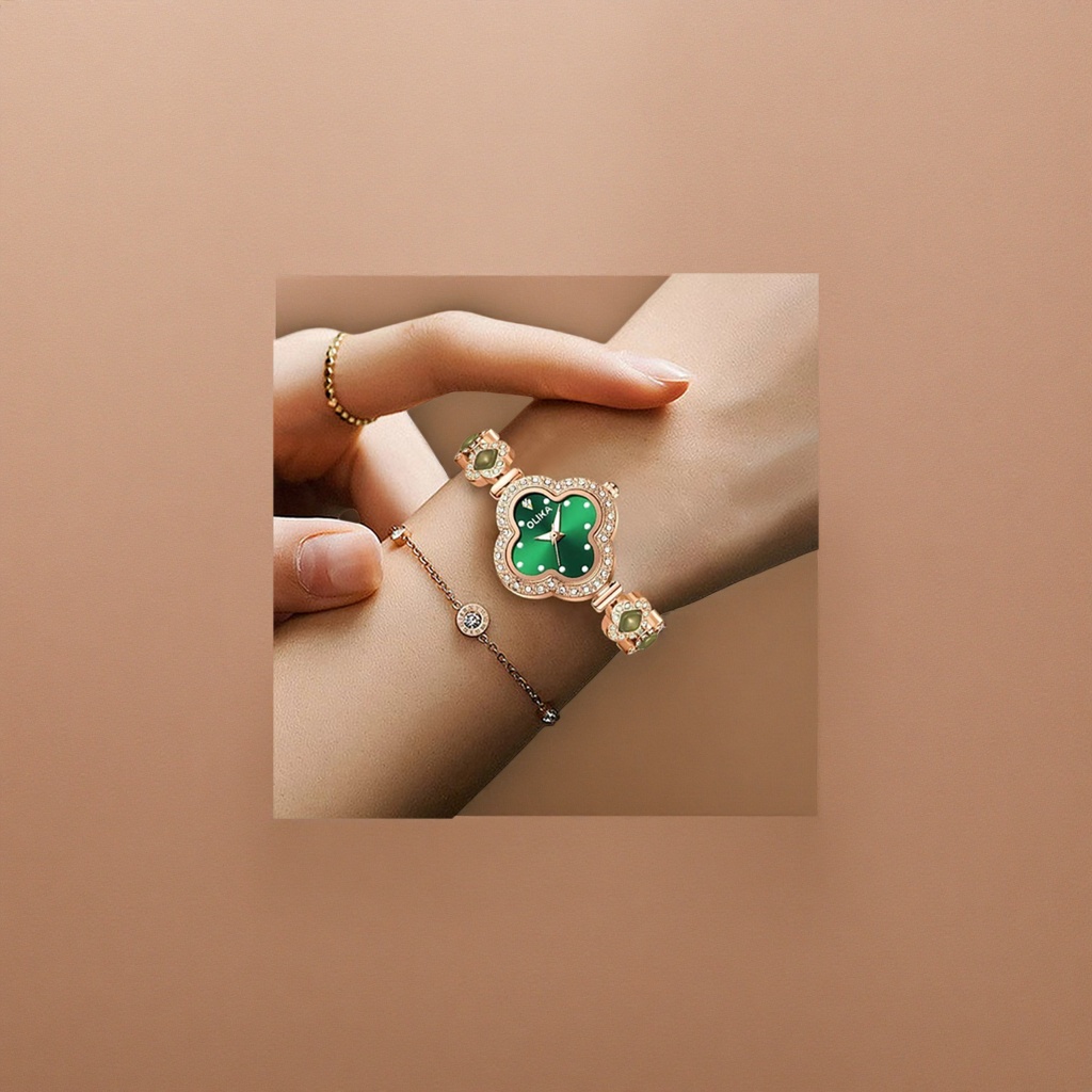 A rose gold four-leaf clover ladies' watch with a green dial