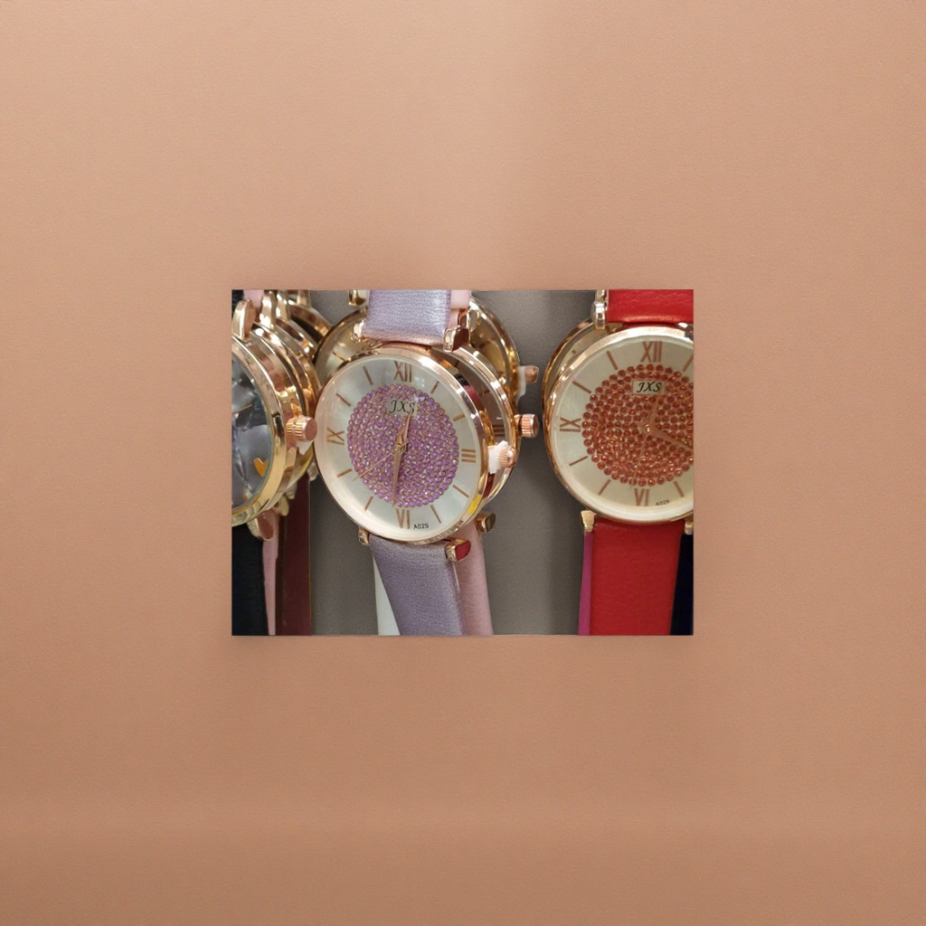 A ladies' watch with a golden case, purple strap and diamonds