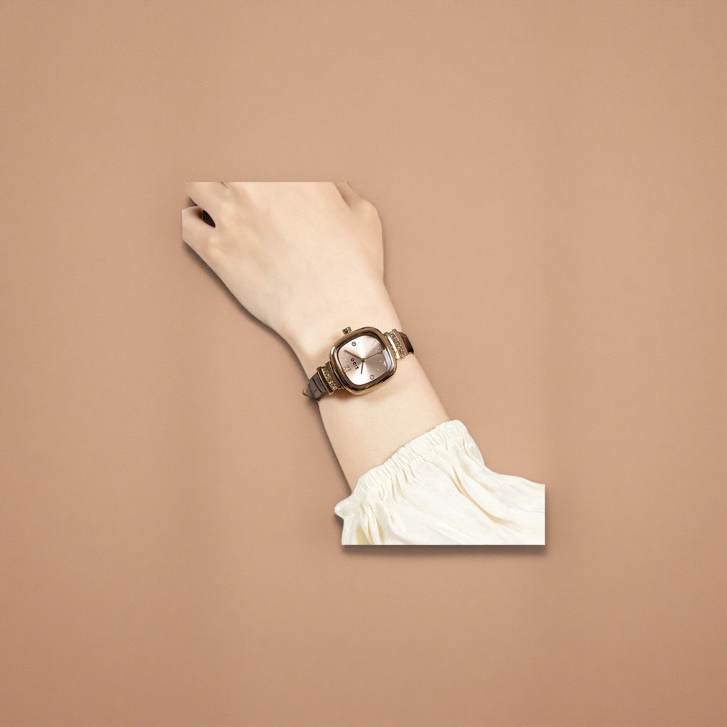 The golden square watch is a fashionable and simple wristwatch suitable for both women and men to wear on the wrist details Picture