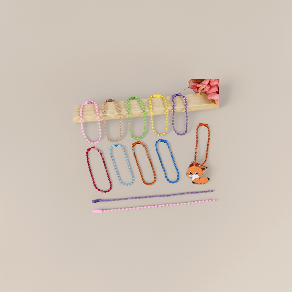 مفاتيح ذات سلاسل خرز ملونة، معلقة على شخصية الموضة، ومزينة صغيرة محمولة Specification image