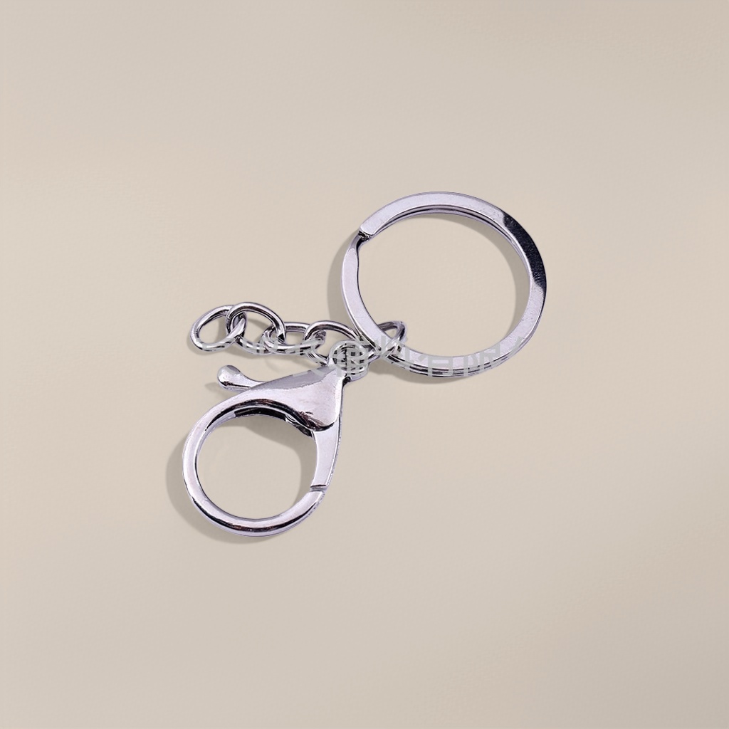 مفاتيح معدنية فضية بسيطة ذات طابع عصري details Picture