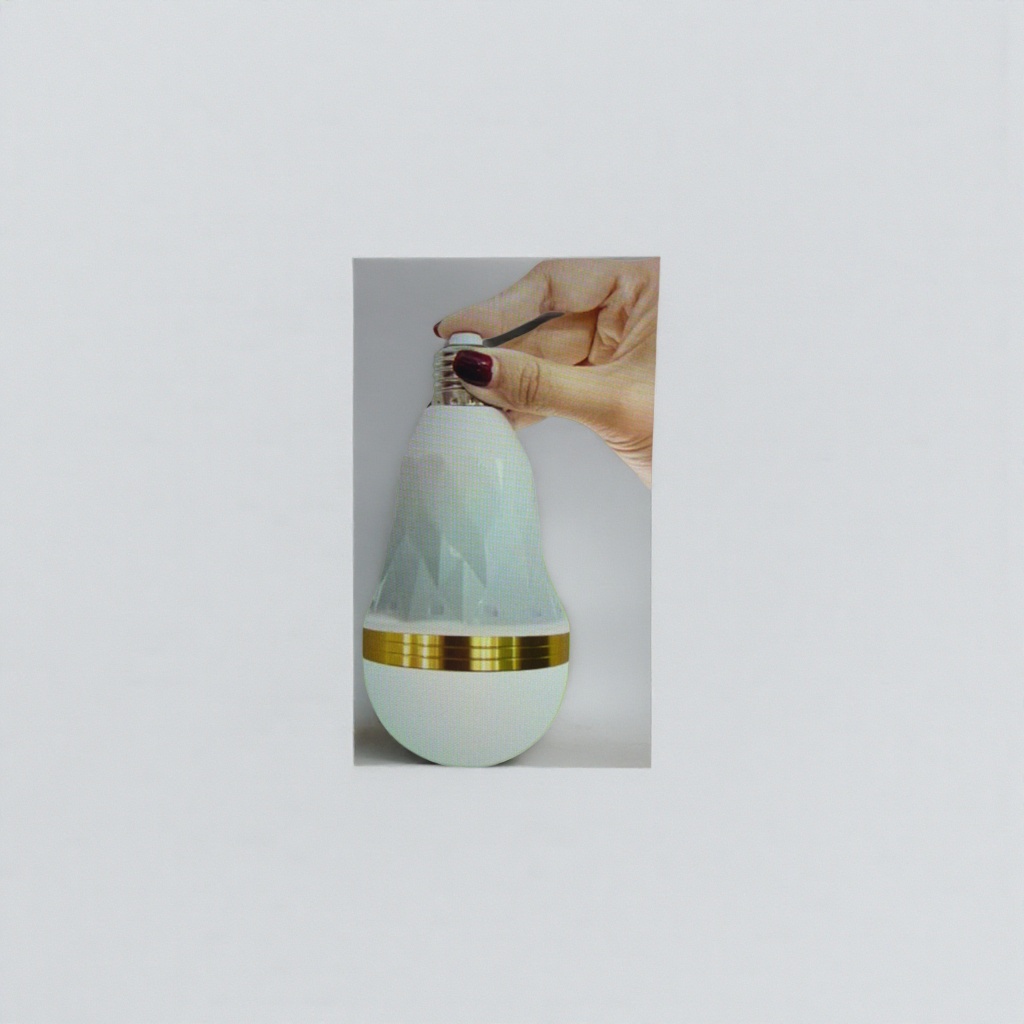The white light bulb is decorated with a golden ring at the mouth of the bottle