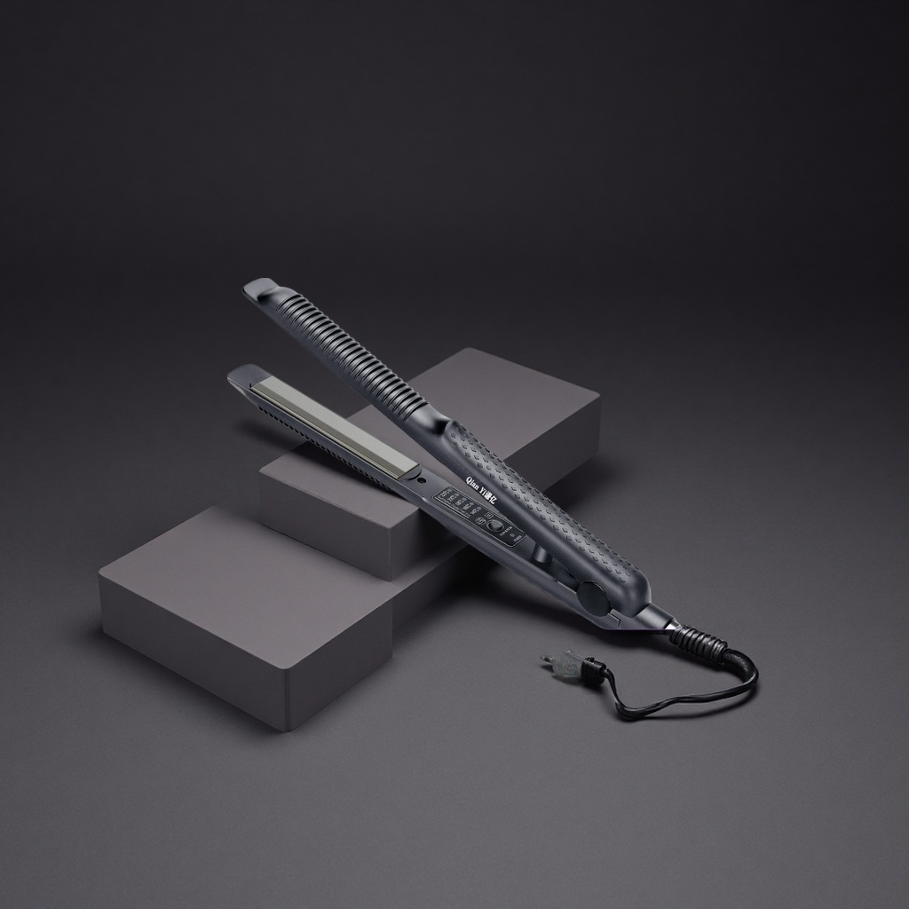 The black straight plate clip is a constant-temperature ceramic that heats up quickly, shapes without damaging hair, and is portable for home use