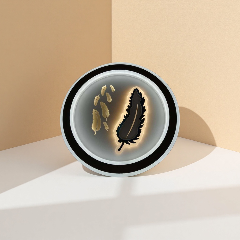 The circular lamp with black borders and white frames is decorated with golden feathers and features a black luminous feather shape Application Scenario