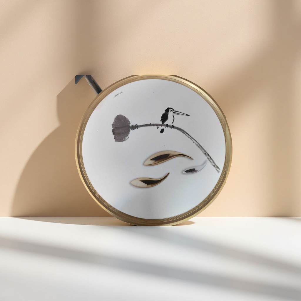 A white round tray with ink-wash birds perching on the branches is decorated with gold and silver metal spoons Specification image
