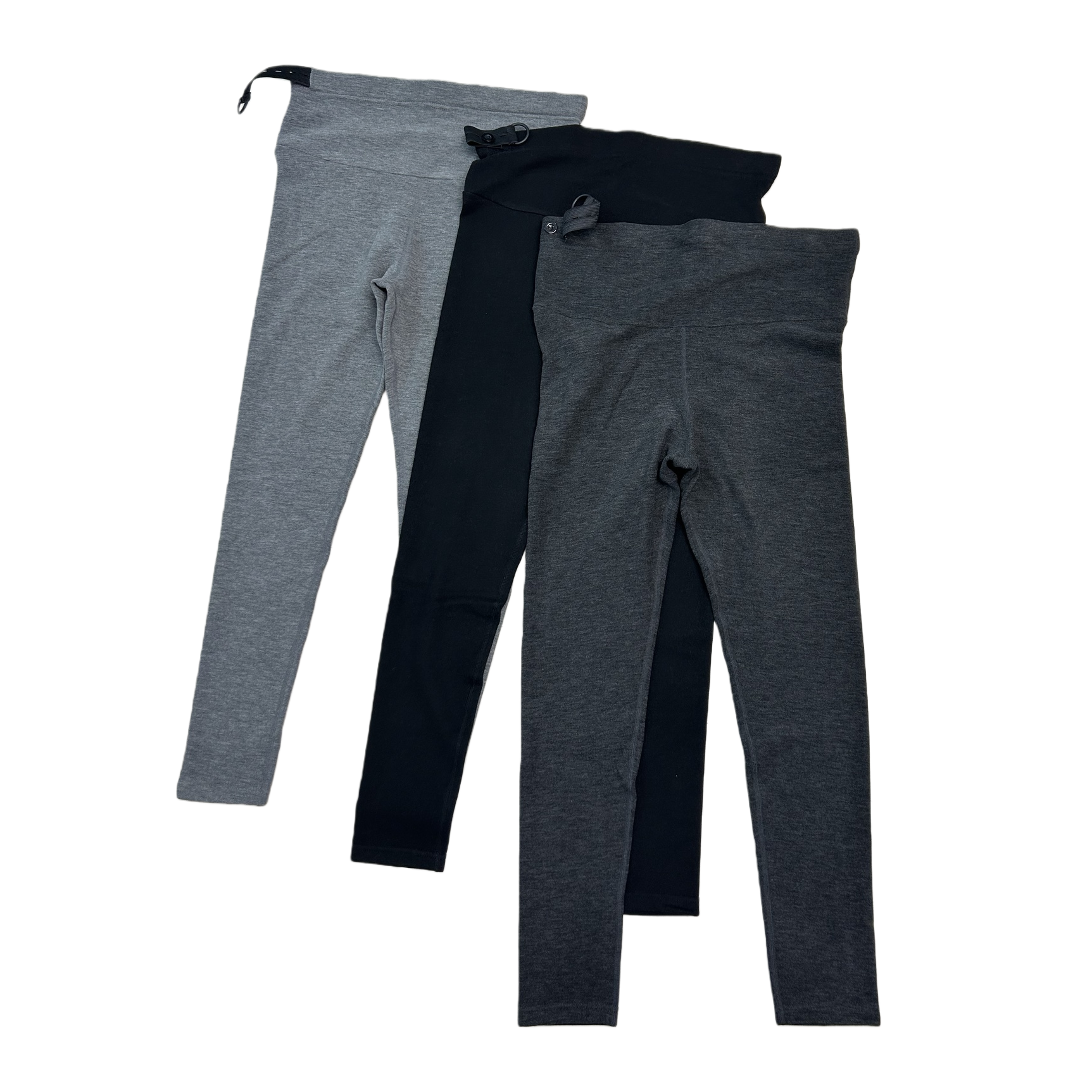 A grey hooded sweatshirt paired with black trousers is displayed on a wooden textured tabletop Item Picture
