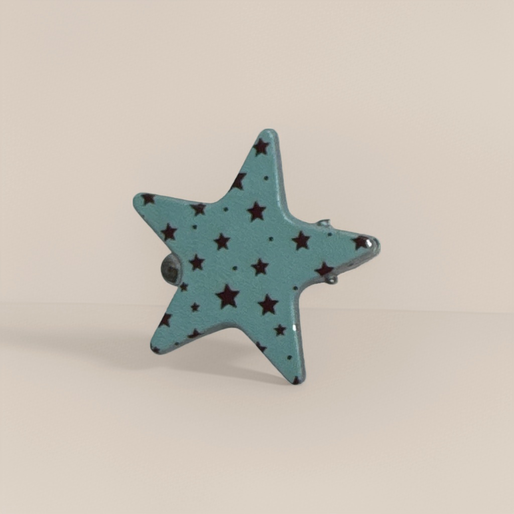 دبوس على شكل نجمة زرقاء فاتحة Specification image