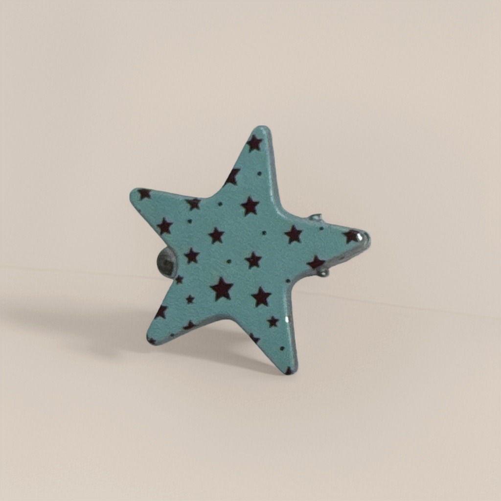 A light blue star-shaped brooch is a fashionable and simple metal accessory for women