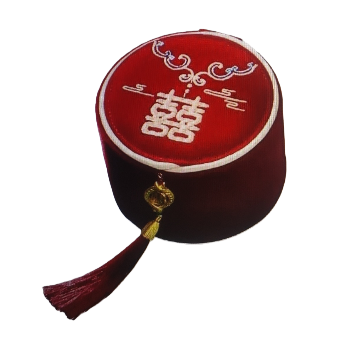 A handmade storage box decorated with golden tassels and featuring red double happiness embroidery