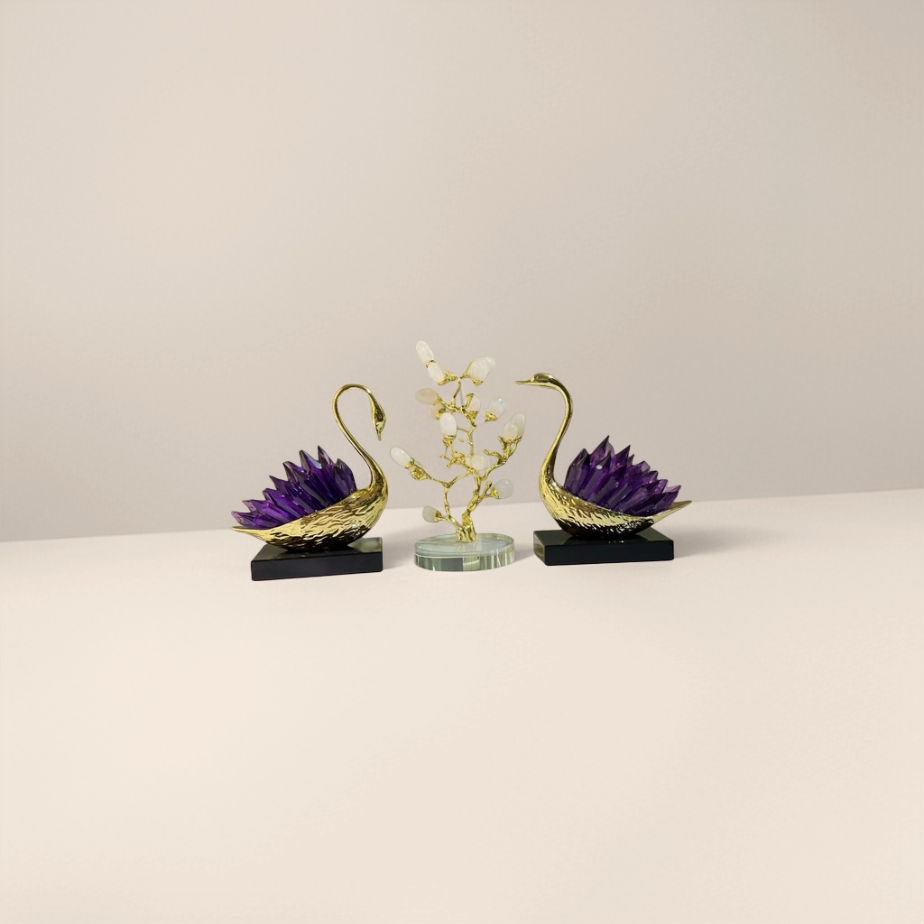 A golden swan figurine with amethyst wing-shaped crystal branch decoration details Picture