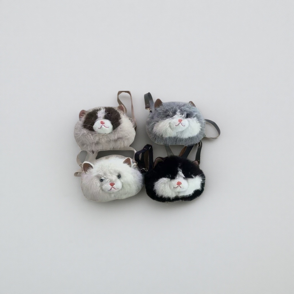 A cute single-shoulder crossbody bag with a plush cat head design details Picture
